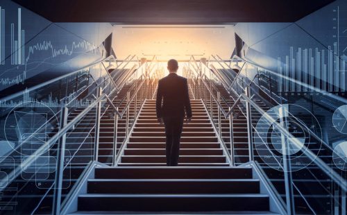 cso_nw_leadership_sucess_businessman_ascending_staircase_surrounded_by_symbols_of_business_acumen_by_metamorworks_gettyimages-957655008-100801476-large